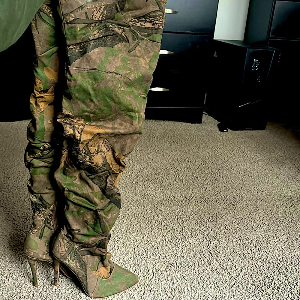 Worn twice camo over the knee high heeled boots !!
